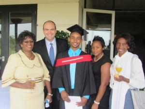 OLG Graduate Gareth Hans with his family and OLG CEO Etienne Stiglingh Mar 2014.