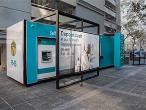 FNB has turned a shipping container into a mobile bank to provide banking services to unbanked citizens.